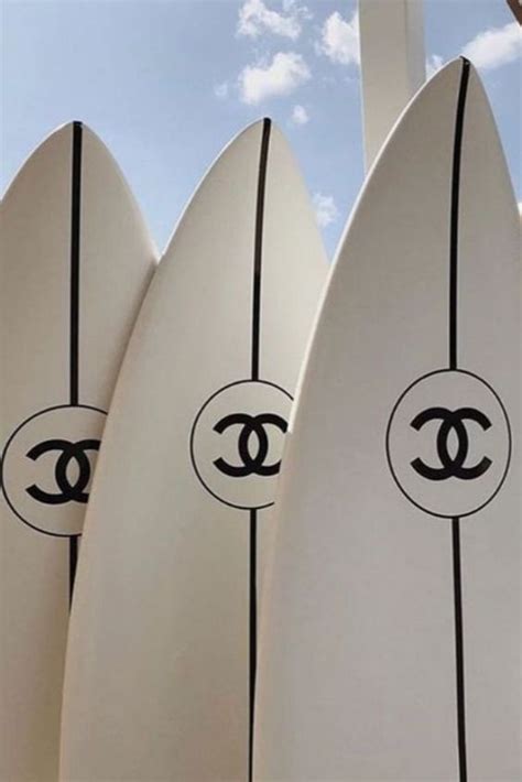 girl with chanel surfboard|chanel surfboard sweatshirt.